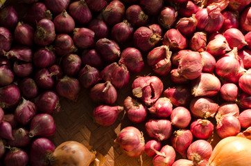 Garlic, Onion And Spices on wooden background. Selective focus.