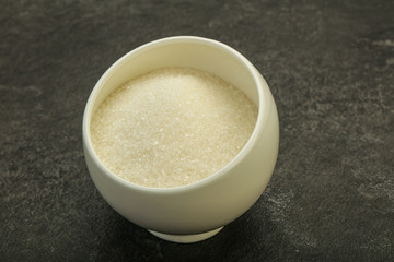 White sugar in the bowl