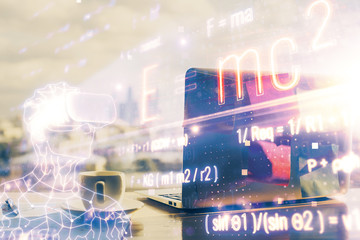 Desktop computer background and formula hologram writing. Double exposure. Education concept.