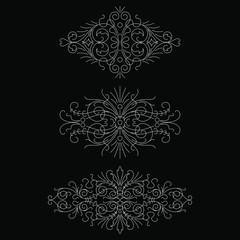 Calligraphic design elements isolated on black background set 1