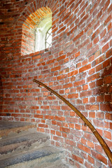 Stairs in a round tower of bricks