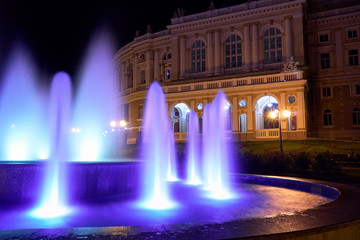Fototapeta premium night view of Opera house in Odessa city, Ukraine. Beautiful city Park and street illumination