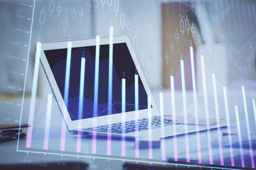 Forex Chart hologram on table with computer background. Multi exposure. Concept of financial markets.