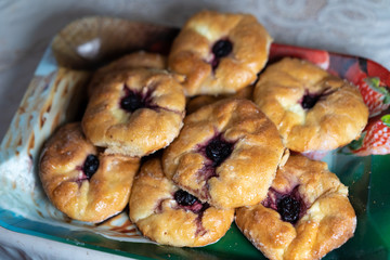 Cooked sweet buns with jam