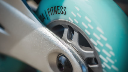 Close up of inline roller skates with blue wheels. Extreme sport. Concept about sport and leisure....