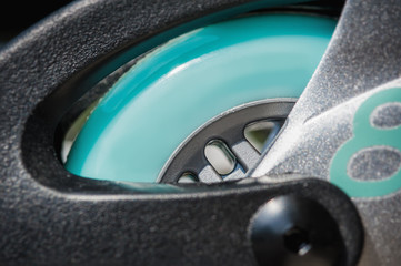Close up of inline roller skates with blue wheels. Extreme sport. Concept about sport and leisure....