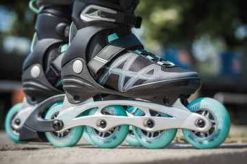 Close up of inline roller skates. Extreme sport. Lifestyle activity. Concept about sport and leisure