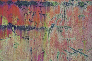 Bright colorful background from rusty metal with red and yellow green shabby cracked paint, Grunge...