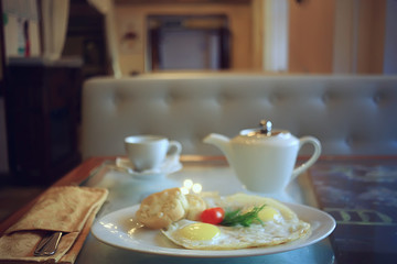 breakfast in a cafe, interior morning food hotel, teapot and cup serving restaurant
