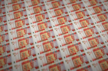 3 cuban pesos convertibles bills printed in illegal money production conveyor. Collage of many fake...