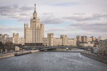 view from the bridge on the Moskva River against the background of the Stalinist skyscraper,...