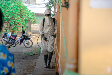 Officers enter the area to spray disinfectants. To prevent the spread of COVID-19