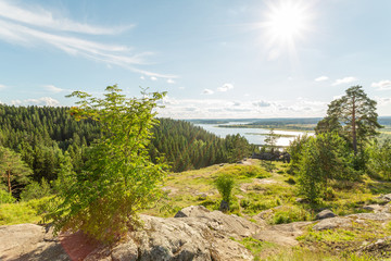 Picturesque panoramic view of the lake from the mountain. Horizontal image.