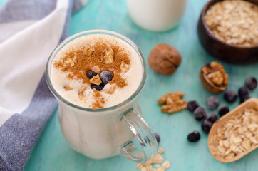 Oatmeal porridge with blueberries and almonds.