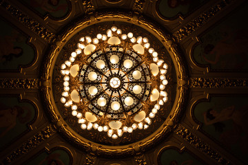 Closeup of chandelier in theatre