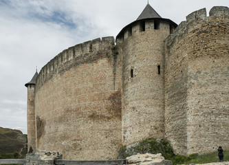 Fototapeta na wymiar Huge Khotyn Fortress walls comparing to a human figure
