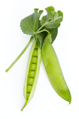 Fresh green pea on a white background. Closeup. Top view.