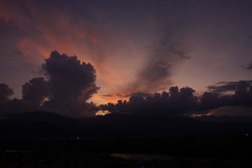 Sunset on the field with clouds colored by the sunset, Japan 