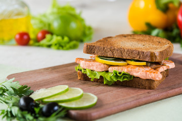sandwich with salmon and vegetables