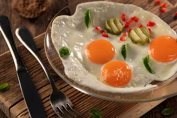 Fried eggs sunny side up healthy breakfast, traditional nutritious meal,top view