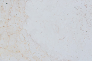 Dolomite texture. Natural rock with beautiful beige patterns on the surface. Polished flat stone. Classic luxury decoration building material. Solid stone background.
