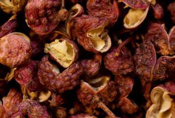 super macro shot food background. plenty more of red Sichuan peppers  very close