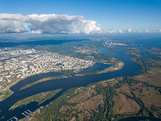 High view of the Dnieper river in Kiev. A cloud over the city.