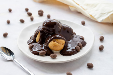 profiterole cake on a white background