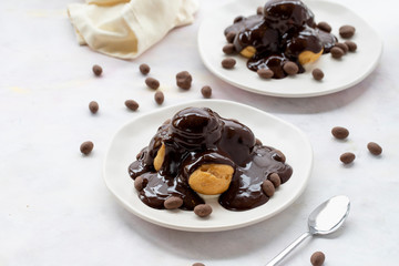profiterole cake on a white background