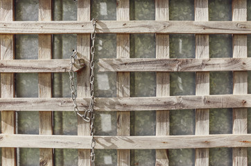 old wooden fence on a steel wall