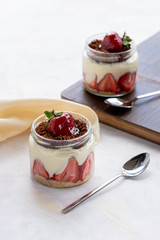 strawberry magnolia cake on a white background