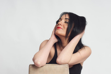 Photo session in the studio. White woman as a model. Portraits