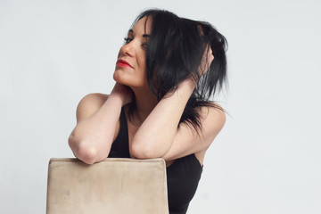Photo session in the studio. White woman as a model. Portraits