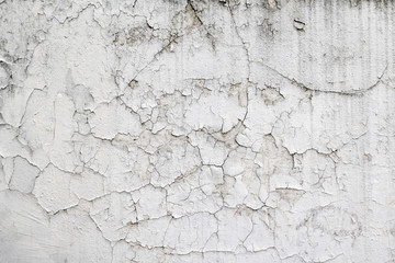 Cracked flaking white paint.