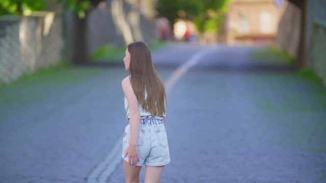 girl in shorts with long hair