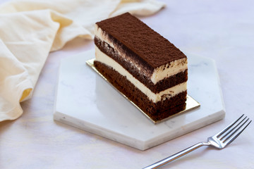 tiramisu cake on white wood