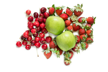 Fruits and berries on white