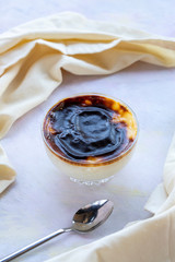 baked rice pudding on white wood - sutlac