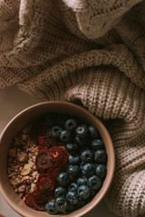 Breakfast with granola, coffee and cakes