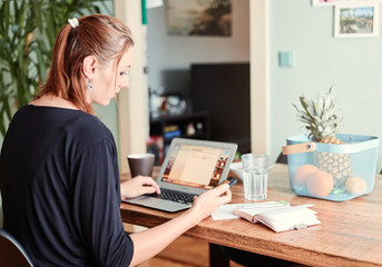 Homeoffice, a woman working on PC