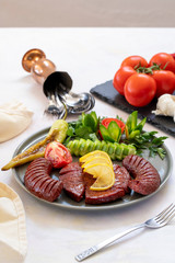 sausage - baked sausage on a white background