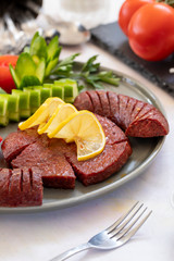 sausage - baked sausage on a white background