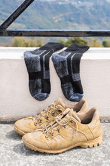 Tourist Hiking shoes with socks. Trekking and Hiking, travel and tourism concept. Close-up stock photo.