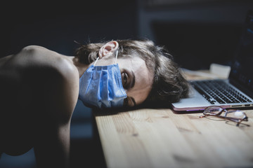 a young girl bored at home in the coronavirus quarantine