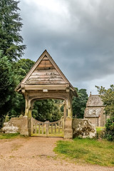 The  elaborate entrance to the cemetery of St benedicts Church in the Norfolk village of Horning