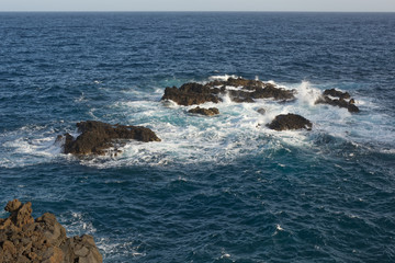 waves on volcanic rocks in Atlantic Ocean off La Palma, Canary Islands, Spain