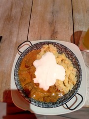 Cottage cheese with veal stew and large portions of sour cream