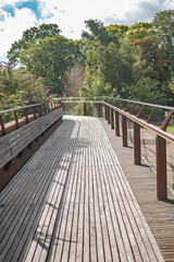 Walking across a friendship bridge in the city of Norwich, Norfolk