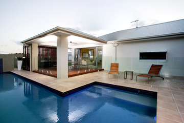 Fototapeta premium A large swimming pool at house backyard 