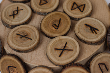 round wooden runes